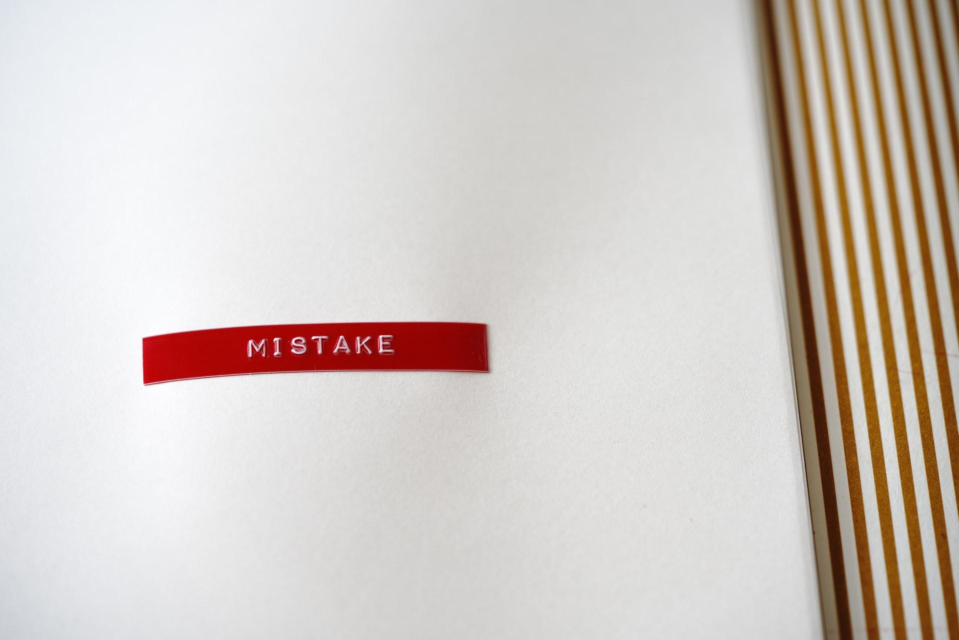 A label in a book that reads "mistake."