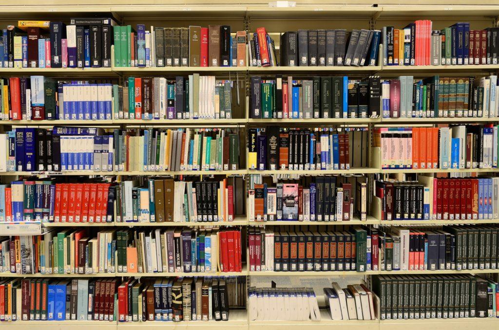 A library shelf of books that make you can expert.